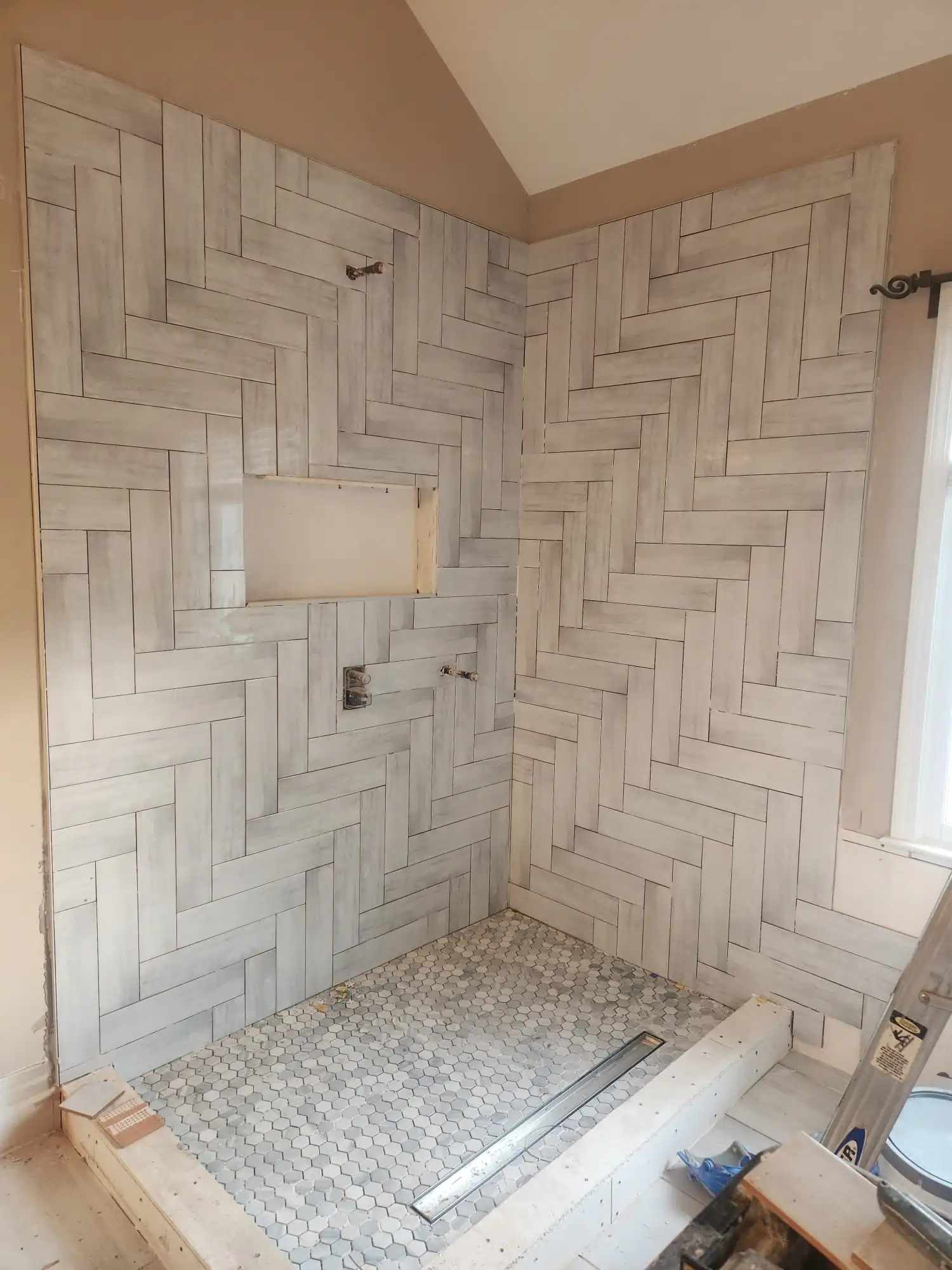 Tile flooring in shower and bathroom