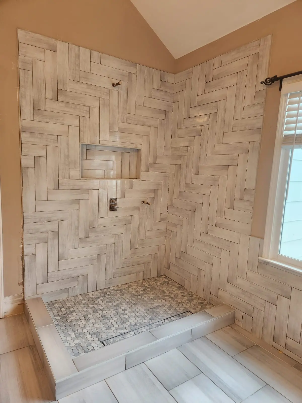 Tile flooring in shower and bathroom