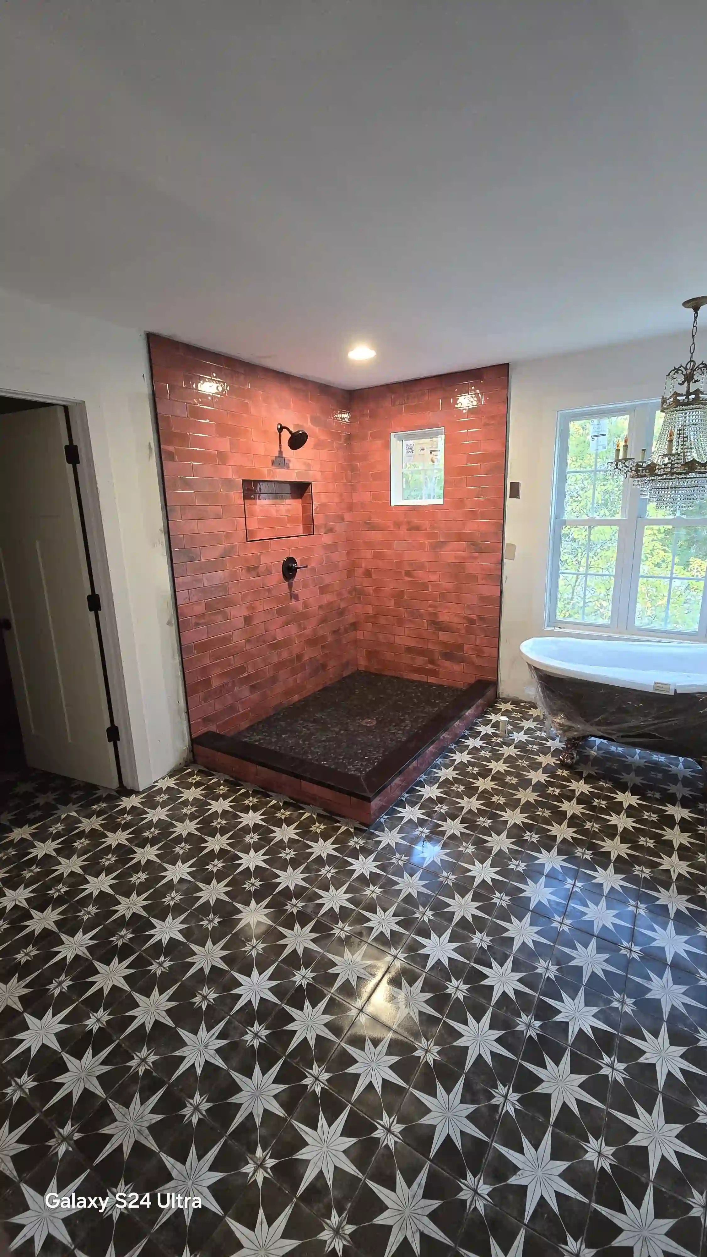 Tile flooring in shower and bathroom