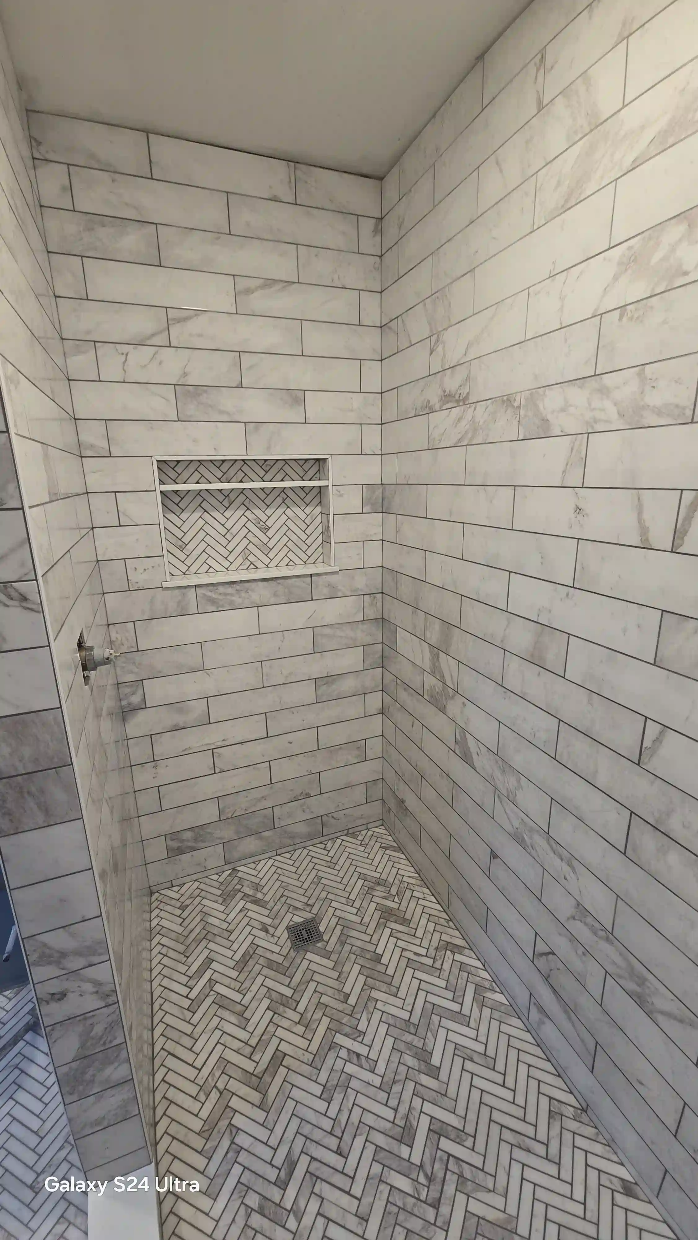 Tile flooring in shower and bathroom